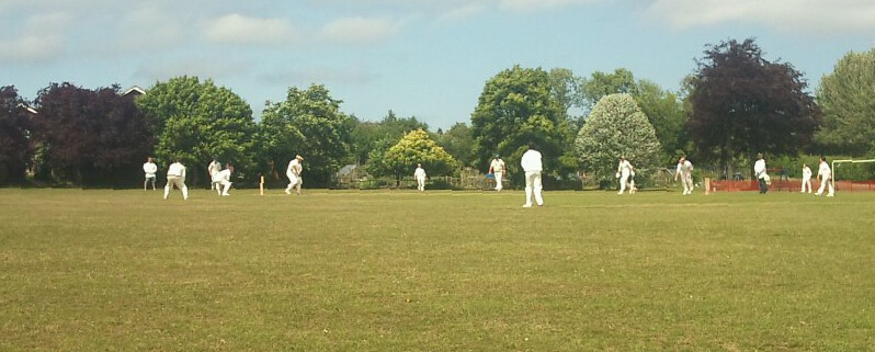 A cricket game taking place at The Rec, Mereworth.
